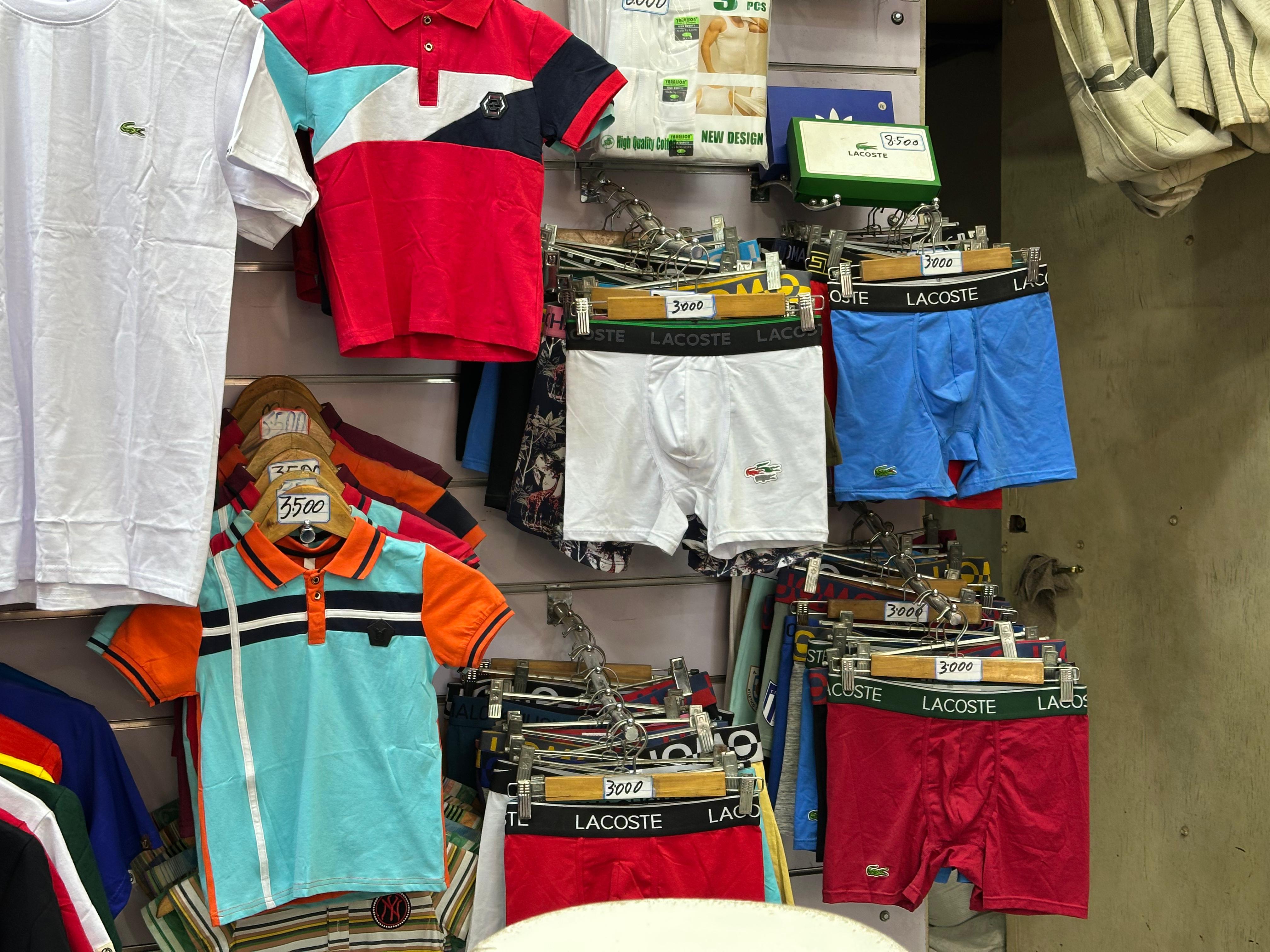 Women's designer handbag with top handle and structured silhouette